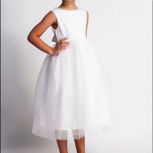 Flower girl dress. White. Pearl detail neckline with tulle bottom
